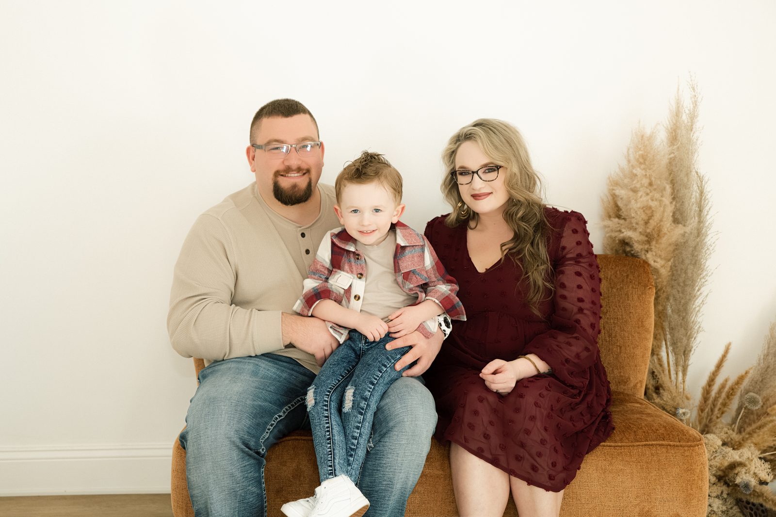 Cameron with his wife and son